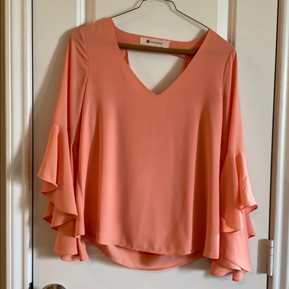 Coral flowy blouse from impeccable pig